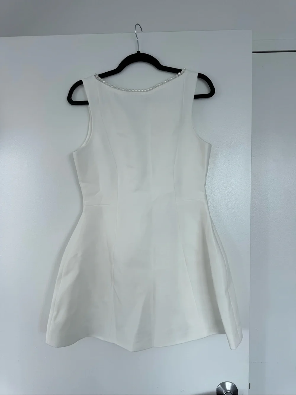 Elegant White Backless Mini Dress with Pearl-Trim Bow